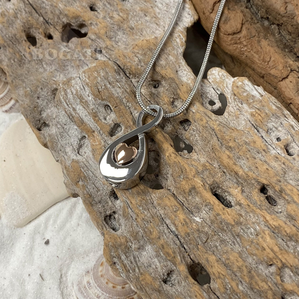 J-997 - Infinity Symbol with rose gold Heart